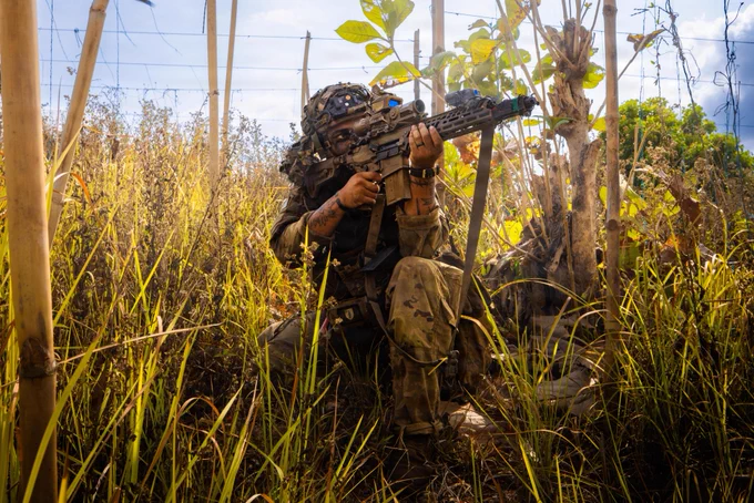 U.S. Army Sgt. Ford Silas, assigned to 2nd Battalion, 35th Infantry Regiment, 3rd Mobile Brigade Combat Team, 25th Infantry Division, engages with opposition forces to clear an objective during the Joint Pacific Multinational Readiness Center Exportable Exercise at Fort Magsaysay, Nueva Ecija, Philippines, May 19, 2026.