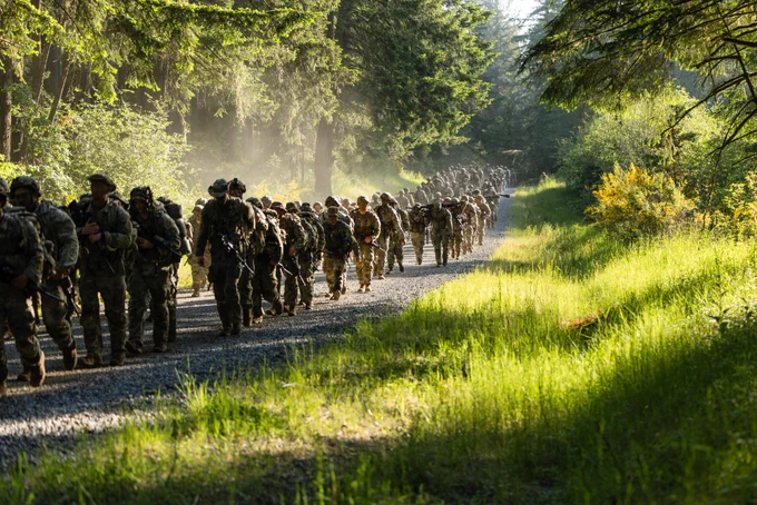 Before the day got moving, 1-2 SBCT, 7th Infantry Division was already under load across Joint Base Lewis-McChord.