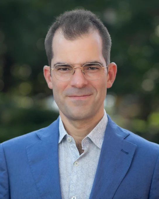 Headshot photo of David Newheiser.