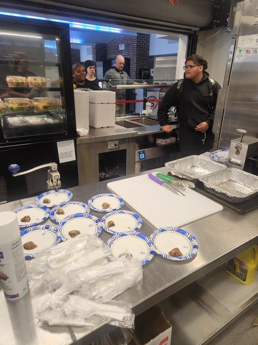 Photo:  SFLA culinary students learning to use the Rational oven