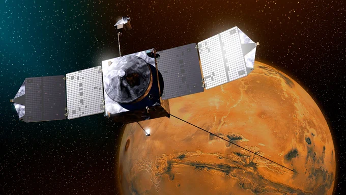 Artist's rendering of NASA's MAVEN spacecraft at Mars. The probe entered orbit around the planet in 2014 and has completed over 11 years of observing the Martian upper atmosphere, ionosphere and interactions with the Sun and solar wind to explore the loss of Mars' atmosphere. (NASA/Goddard/University of Colorado/Laboratory for Atmospheric and Space Physics)