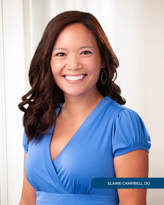 Dr. Elaine Campbell of Tryon Medical Partners smiles in a professional portrait in front of a white backdrop.