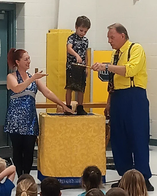 Jumpstart student helping magician