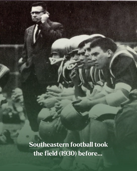Black-and-white archival photograph of Southeastern football players sitting on the sideline during a game while a coach stands behind them. Text reads: "Southeastern football took the field (1930) before..."