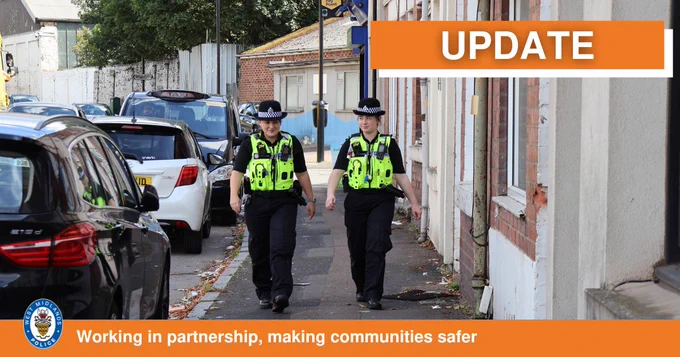 Two West Midlands Police officers walking on a street, with an 'UPDATE' banner above.