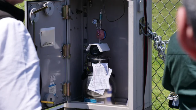 The photo shows an air quality monitor placed in Garden Grove. 