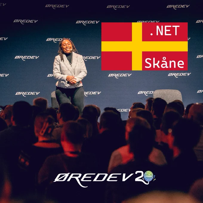 Speaker presenting on stage at Øredev conference with .NET Skåne logo displayed on screen behind.
