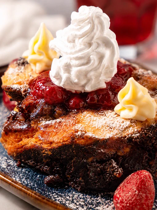 Chocolate Babka French Toast at The Brunch Project Bangalore, thick toasted babka topped with berry compote, whipped cream, powdered sugar and butter, indulgent brunch dessert, best French toast in Koramangala.