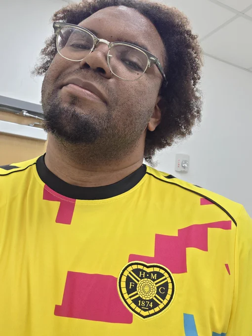 A selfie of me displaying the Hearts FC logo on my shirt.