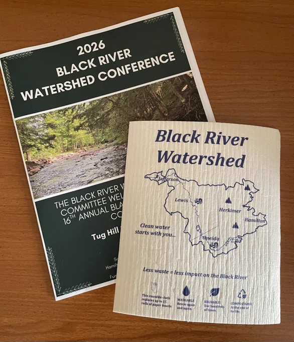 Photo of the conference program for the 2026 Black River Watershed Conference.
