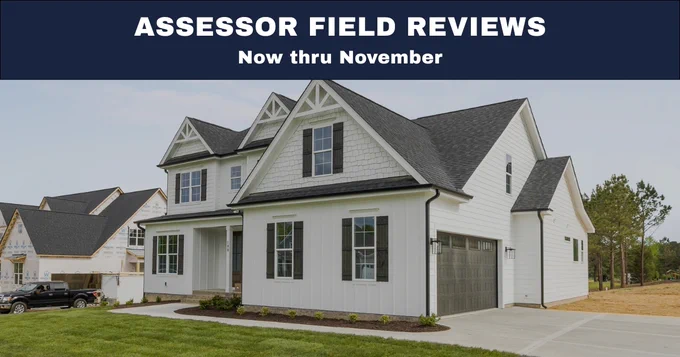 A newly constructed home with message Assessor Field Review Now Thru November.