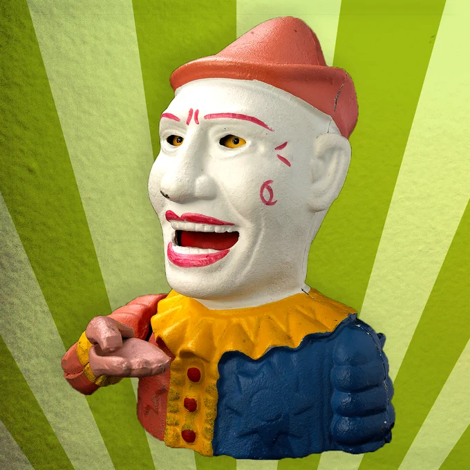 Buste de clown jouet qui ouvre la bouche et étire le bras, la main placée sous la fente pour les pièces.