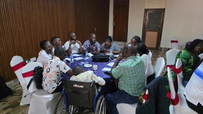 Participants engage in a small group discussion during a disability-inclusive justice workshop in Kisumu, sharing experiences and recommendations for improving access to justice for persons with disabilities.