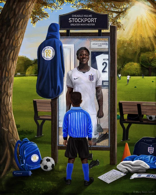 A young Kobbie Mainoo is stood in his grassroots kit looking at a mirror at the reflection of his present self stood in an England kit.