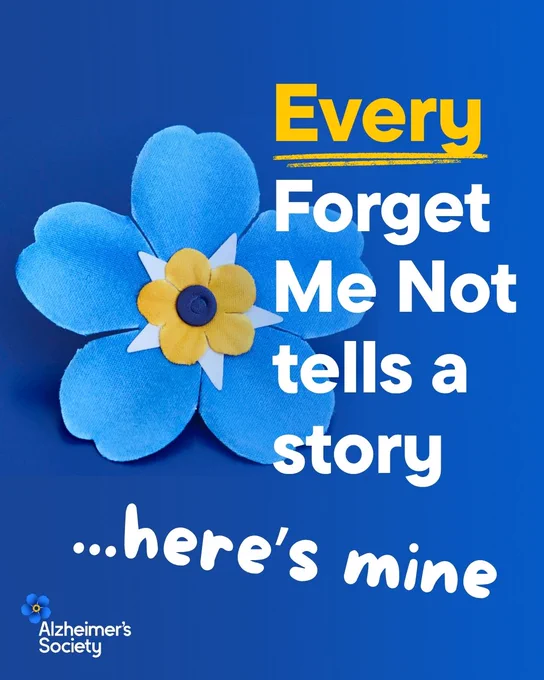 A pale blue badge in the shape of a forget-me-not flower on a navy-blue background with white text. Text reads, \u201CEvery Forget Me Not tells a story. Here\u2019s mine.\u201D