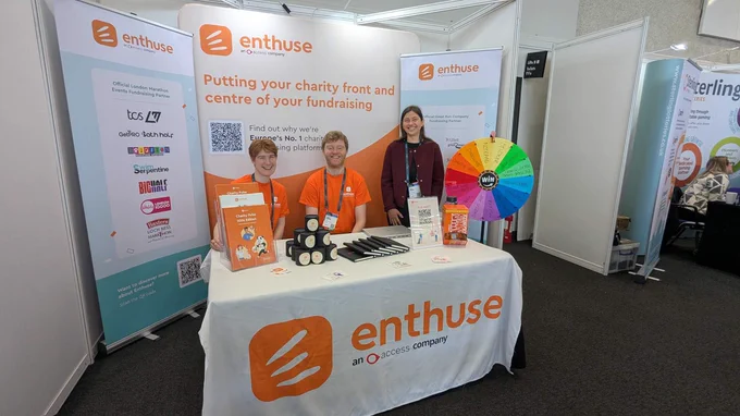 the enthuse team set up with branded goods at the ciof fundraising convention