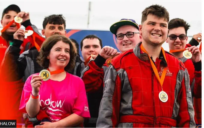 people who took part in Halow holding up medals