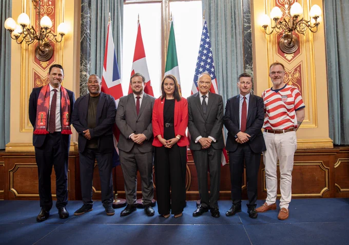 A group photo of DCM Robert Thomas with fellow hosts from UK Government, Canada, and Mexico, and former England soccer player John Barnes.