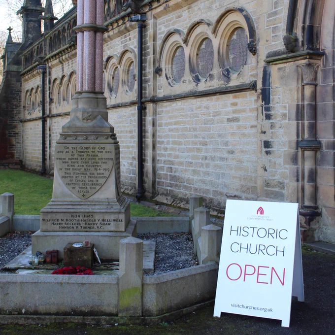 A historic church with an A-Board outside, which displays the words "Historic Church Open" (c) CCT