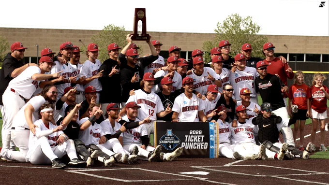 Team poses with regional trophy.
