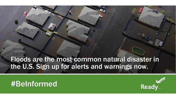 A flooded residential area with the message that flooding is the most common natural disaster in the United States so be prepared.