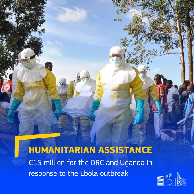 Healthcare workers wearing full protective suits and masks carry a covered body through a crowd during an Ebola outbreak response. The image includes a blue overlay with the text: ‘Humanitarian Assistance – €15 million for the DRC and Uganda in response to the Ebola outbreak,’ alongside the European Commission logo.