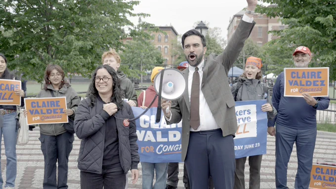 Zohran Mamdani on megaphone endorsing Claire Valdez at a rally in Bushwick, Brooklyn