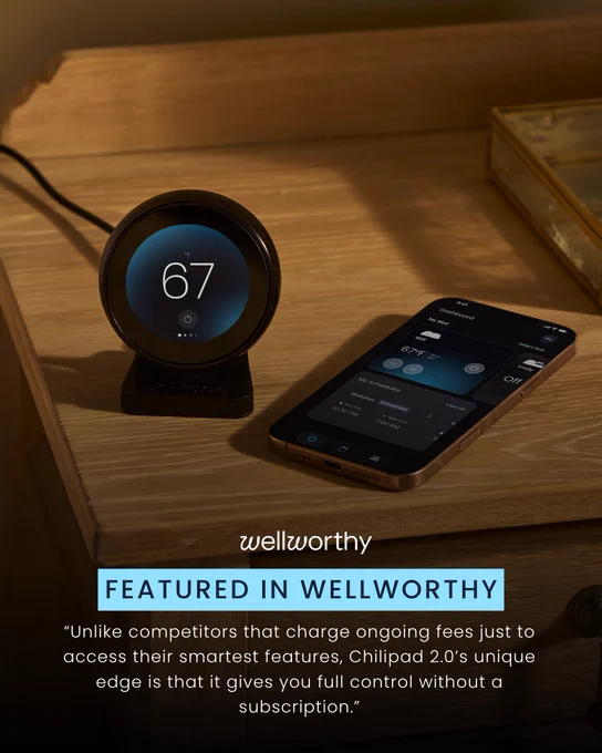 A Chilipad 2.0 temperature control device is displayed on a nightstand, showcasing its digital interface alongside a connected smartphone app. The setting evokes a modern and tech-savvy atmosphere.