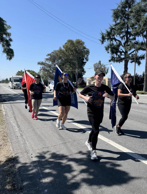Members of the Sheriff's Office participate in the Law Enforcement Torch Run benefitting Special Olympics athletes.