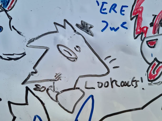 Closeup of the whiteboard framing a scruffy drawing of Robin