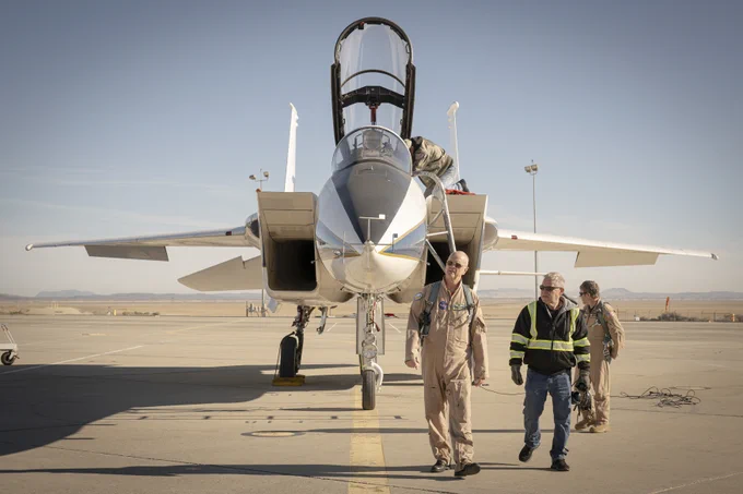 NASA pilot Nils Larson, left, walks next to crew chief Walt Kondracki, right, by an F-15 aircraft Tuesday, Jan. 13, 2026, at NASA’s Armstrong Flight Research Center in Edwards, California. Credit: NASA/Christopher LC Clark