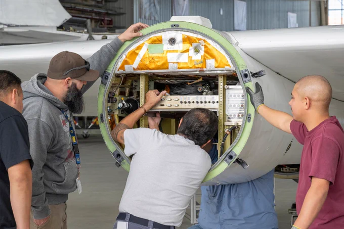From left, NASA avionics technician Jesse Orellana; quality assurance employee Jose Prieto; mechanic Francisco Rodriguez; and mechanic Vincent Moreno work on an ER-2 aircraft Monday, Jan. 26, 2026, at NASA’s Armstrong Flight Research Center in Edwards, California. Credit: NASA/Christopher LC Clark
