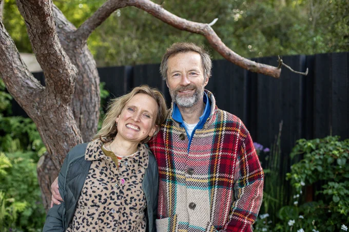 Garden designer Angus Thompson poses with his wife Kate Binnie on the asthma and lung UK Breathing Space garden.