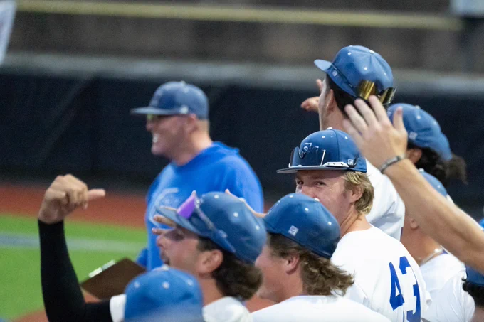 The Cougars celebrate a victory over the Parkland Cobras (IL) on May 23 at the NJCAA DII World Series. 