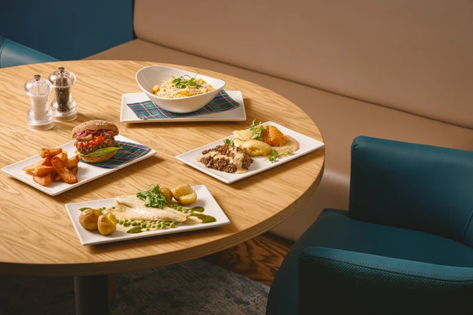 Sea bass with a pea velouté and baby potatoes
Plant-based burger in a Schär roll with chips,  
Macsween’s haggis, neeps and tatties with a whisky sauce, and
Lammermuir cheddar mac 'n' cheese with an optional parsley crumb.