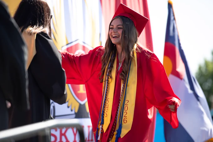 Skyline High graduate complete graduation ceremony