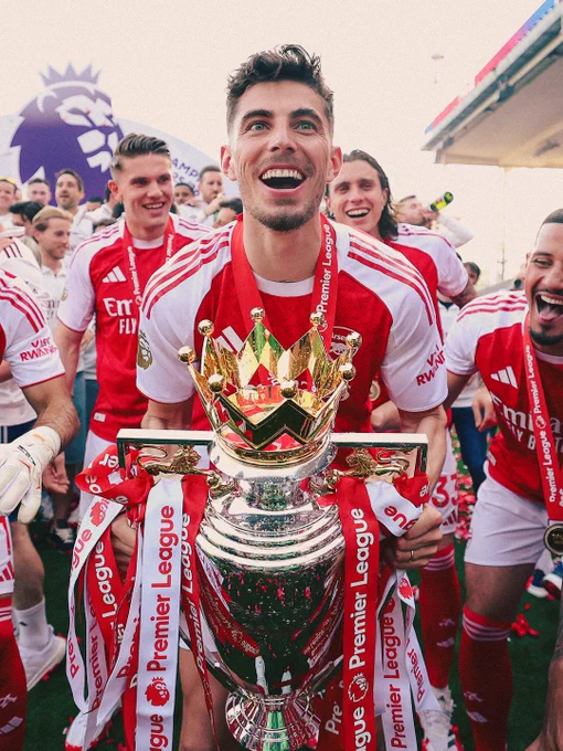 Kai Havertz celebrates with the Premier League trophy