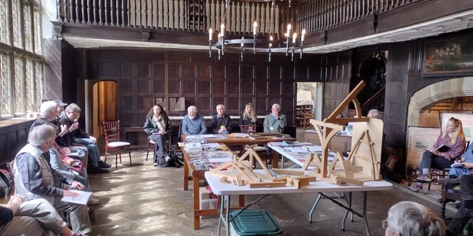 Discussion inside Oakwell Hall on the development of the building.