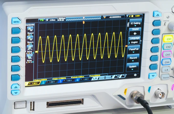 sine wave displayed on an oscilloscope