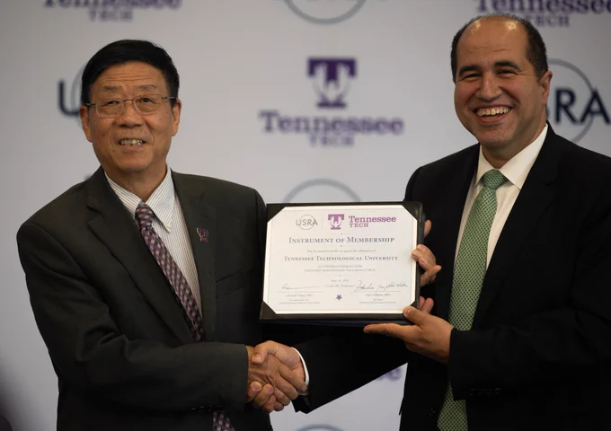 Tennessee Tech Interim Provost John Liu is pictured with Universities Space Research Association President and CEO Elsayed Talaat at a May 18 event formally welcoming Tech into USRA membership.