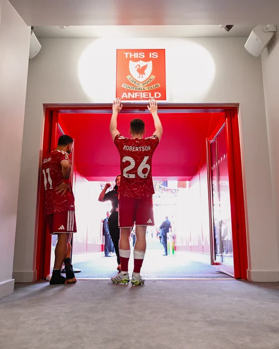 Photography of Andy Robertson and Mo Salah in the tunnel at Anfield.