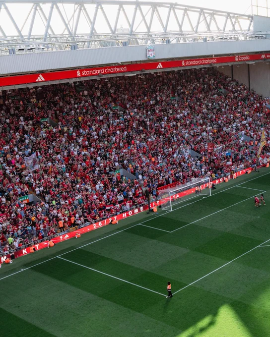 Photography of the Kop at Anfield after full-time.