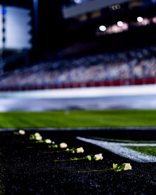 Roses are placed on the No. 8 in the infield at Charlotte.