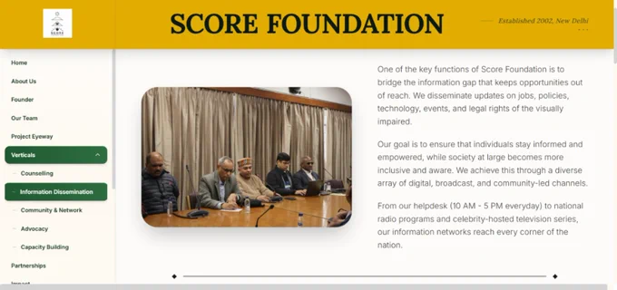 Screenshot of the Information Dissemination section on the Score Foundation website showing a meeting setup and text explaining how the organization bridges information gaps through updates on jobs, policies, technology, and legal rights for visually impaired communities.
