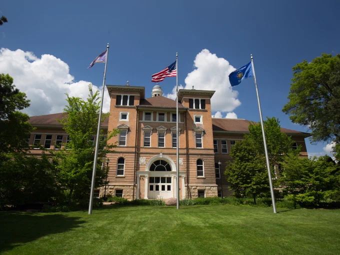 American flag in front of Old Main
