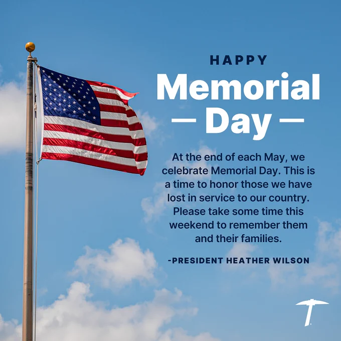 The image features an American flag waving against a blue sky with some clouds. Text reads, "Happy Memorial Day." Below, it states, "At the end of each May, we celebrate Memorial Day. This is a time to honor those we have lost in service to our country. Please take some time this weekend to remember them and their families." At the bottom, it says, "-President Heather Wilson." UTEP's logo is in the bottom right corner.
