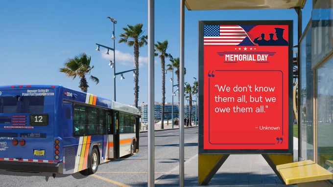 Bus stop shelter with a Broward County Transit bus and palm trees nearby. A red Memorial Day poster with an American flag and military silhouettes reads: “We don’t know them all, but we owe them all.” — Unknown.