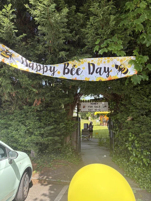 A banner saying happy bee today