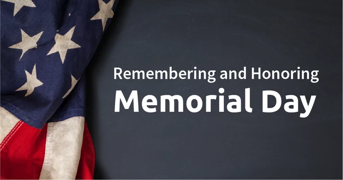 Close-up of a folded American flag beside text honoring Memorial Day on a dark background.