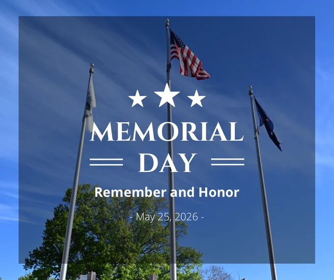 A photograph taken at the Chester County Public Safety Training Campus of the American flag, the Commonwealth of Pennsylvania flag, and the County of Chester flag blowing in the wind in. With a bright blue sky background and a tree showing in the distance. With three stars and the wording: Memorial Day, Remember and Honor, May 25, 2026 overlayed on top of the photograph.